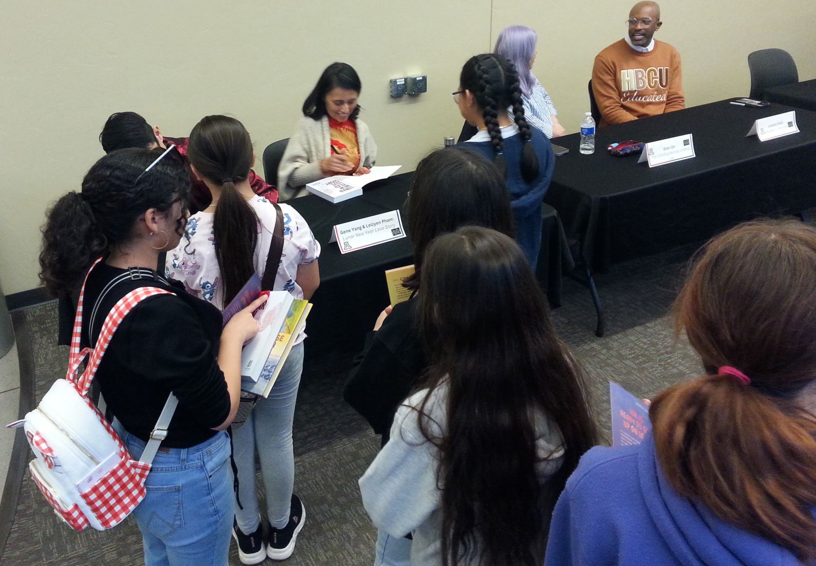 Students line up to have their books signed at the Festival of Books