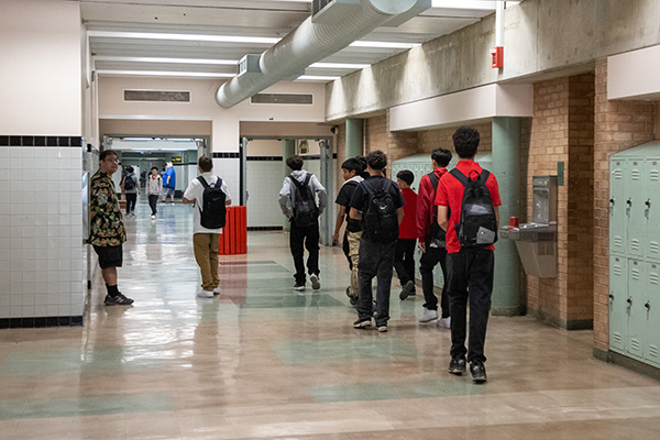 Students walk through the hallway